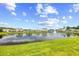 Picturesque pond view with a fountain creates a serene and inviting community atmosphere at 317 Truce St., Myrtle Beach, SC 29588