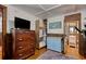 Multi-purpose bedroom featuring a closet, exercise equipment, and an ensuite bathroom at 325 Orange St., Georgetown, SC 29440