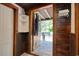 Rustic entryway showcasing wooden accents and a view of the inviting front porch at 325 Orange St., Georgetown, SC 29440