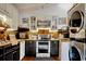 Charming kitchen with stainless steel appliances and lots of storage space at 325 Orange St., Georgetown, SC 29440