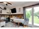Cozy living room with sliding glass doors to outdoor area and comfortable seating arrangement at 325 Orange St., Georgetown, SC 29440