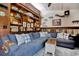 Spacious living room with custom built-in shelving and comfortable blue sofa at 325 Orange St., Georgetown, SC 29440