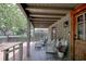 Charming porch area with comfortable seating, perfect for enjoying the outdoors at 325 Orange St., Georgetown, SC 29440
