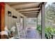 Cozy covered porch with rocking chairs, offering a relaxing view of the neighborhood at 325 Orange St., Georgetown, SC 29440