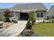 The backyard features a pergola, paved patio, and well-maintained lawn, creating an ideal outdoor oasis at 340 Barony Dr., Conway, SC 29526