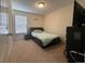 This cozy bedroom offers carpet floors, a window, and a comfortable bed, perfect for relaxation at 340 Barony Dr., Conway, SC 29526