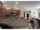 Spacious kitchen with stainless steel appliances, granite countertops, and dark wood cabinets at 340 Barony Dr., Conway, SC 29526