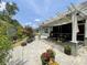 Outdoor patio featuring a pergola, swing, and decorative plants, creating a charming and inviting space at 340 Barony Dr., Conway, SC 29526