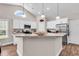 Well-lit kitchen showcasing granite countertops, stainless steel appliances, and an open design at 3864 Journeys End Rd., Murrells Inlet, SC 29576