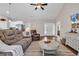 Comfortable living room with wood floors, neutral decor, and a bright, welcoming atmosphere at 3864 Journeys End Rd., Murrells Inlet, SC 29576