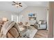 Cozy living room with vaulted ceilings, neutral walls, and comfortable seating arrangement at 3864 Journeys End Rd., Murrells Inlet, SC 29576