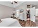 Main bedroom with en suite bathroom, walk-in closet, dresser, and TV at 3864 Journeys End Rd., Murrells Inlet, SC 29576