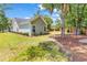 A house with a well-maintained yard featuring established plantings along the foundation at 3864 Journeys End Rd., Murrells Inlet, SC 29576