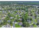 Community aerial shot highlighting the home's location with mature trees and landscaping at 3888 Stillwood Dr., Myrtle Beach, SC 29588