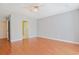 Bright bedroom featuring hardwood floors, a ceiling fan, and access to an attached bathroom at 3888 Stillwood Dr., Myrtle Beach, SC 29588