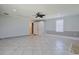 Large living room featuring tile floors, storage space, natural light, and neutral wall paint at 3888 Stillwood Dr., Myrtle Beach, SC 29588
