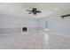 Spacious living room with tile floors, fireplace, and a door leading to the backyard at 3888 Stillwood Dr., Myrtle Beach, SC 29588