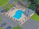 Overhead shot of the pool area, showcasing the crystal-clear water and ample lounging space at 3888 Stillwood Dr., Myrtle Beach, SC 29588