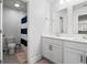 Bright bathroom with double sink vanity, neutral accents, and tile flooring at 405 Spring View Ct., Little River, SC 29566