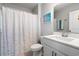 Clean, bright bathroom featuring a stylish vanity, modern fixtures, and a shower with a themed curtain at 405 Spring View Ct., Little River, SC 29566