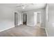Spacious bedroom boasts wood-look flooring, neutral paint, and doorways to other rooms at 4249 E Highway 9, Loris, SC 29569