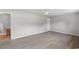 Spacious main bedroom with neutral walls, modern vinyl floors leading to the bathroom at 4249 E Highway 9, Loris, SC 29569