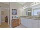 Bathroom with granite counters, double vanity, and decorative mirror at 428 Arlington Circle, Murrells Inlet, SC 29576