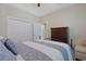 Inviting bedroom with tray ceiling, plush bedding, wood floors, and a bright and airy aesthetic at 428 Arlington Circle, Murrells Inlet, SC 29576