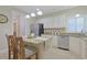 Modern kitchen showcasing granite counters, stainless steel appliances, and ample cabinet space at 428 Arlington Circle, Murrells Inlet, SC 29576