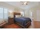 Bedroom featuring hardwood floors, natural light, and tray ceilings at 428 Arlington Circle, Murrells Inlet, SC 29576