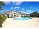 Community pool with landscaping and residential buildings in the background on a sunny day at 428 Arlington Circle, Murrells Inlet, SC 29576