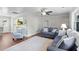 Well-lit living room featuring hardwood floors, comfortable seating, and open layout at 4325 Ellis Ave., Little River, SC 29566