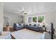 Comfortable living room showcasing hardwood floors, neutral walls, and large window views at 4325 Ellis Ave., Little River, SC 29566