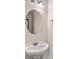 Close-up of the bathroom sink, mirror, and lighting fixture at 445 Mooreland Dr., Myrtle Beach, SC 29588