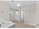 Bright bathroom with double sink vanity, walk in shower, and tiled floor at 445 Mooreland Dr., Myrtle Beach, SC 29588