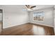Bright bedroom with a ceiling fan and window, offering a comfortable and relaxing space at 445 Mooreland Dr., Myrtle Beach, SC 29588