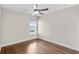 Spare bedroom with neutral walls and wood flooring complemented by a window at 445 Mooreland Dr., Myrtle Beach, SC 29588