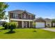 Charming two-story brick home with a well-manicured lawn and a two car garage at 445 Mooreland Dr., Myrtle Beach, SC 29588