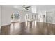 Open-concept living space with hardwood floors, arched entryways, and natural light at 445 Mooreland Dr., Myrtle Beach, SC 29588