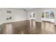 Bright, open living room features beautiful hardwood floors and large window at 445 Mooreland Dr., Myrtle Beach, SC 29588