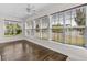 Sun-drenched room boasts hardwood floors and large windows at 445 Mooreland Dr., Myrtle Beach, SC 29588