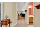 Warm entryway showcases the open floor plan connecting the living area, kitchen, and bathroom at 447 Mahogany Dr. # 102, Murrells Inlet, SC 29576