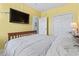 Comfortable bedroom showcasing a full-sized bed, closet, and tv at 4518 N Plantation Dr. # G-5, Little River, SC 29566