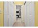 Hallway leading to a bathroom with a shower and toilet at 4518 N Plantation Dr. # G-5, Little River, SC 29566