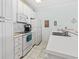 Clean white kitchen with a full appliance package at 4518 N Plantation Dr. # G-5, Little River, SC 29566