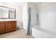 Bathroom features a shower-tub combo, vanity with sink, and neutral tile floors at 468 Papyrus Circle # 468, Little River, SC 29566