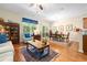 Spacious living area with hardwood floors connecting to the dining space at 468 Papyrus Circle # 468, Little River, SC 29566