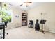 Open home office with bookshelves, ceiling fan, neutral colors and a bright window to let in plenty of natural light at 468 Papyrus Circle # 468, Little River, SC 29566