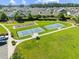 Overhead view of community tennis and bocce ball courts nestled among the neighborhood homes at 468 Papyrus Circle # 468, Little River, SC 29566