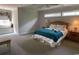 Bedroom featuring a window seat and an area rug under a large bed at 4744 Bucks Bluff Dr., North Myrtle Beach, SC 29582